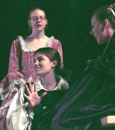 Megan Johnson (Mamillius) tells Candace Zent (Hermione) and Guinevere Park-Hall (Hesperia) a story.