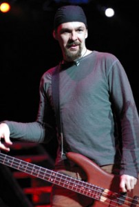 Godsmack Bassist Robbie Merril jams some cords.