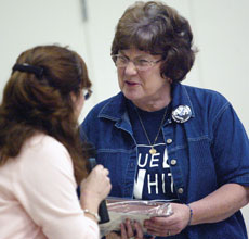 Margie Bell, right, recieves an award from BC Journalism adviser Kathy Freeman for 34 years of excellence in Journalism.