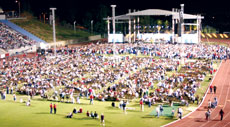 Thousands gather in Memorial Stadium during the Kern County Festival 2004 with Franklin Graham.