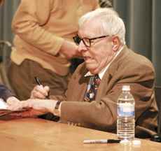 Science fiction auhor Ray Bradbury signs books for his fans during the final event of One Book One Bakersfield on March 28. Bradbury´s Fahrenheit 451 was chosen as this year´s book.