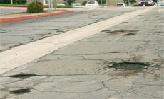 Potholes behind the BC bookstore.