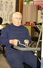 Stanley Moore, 76 year old student, works out in his P.E. class.