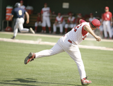 Bakersfield College third  baseman Jacob Ramirez stretches to throw out Canyons´ Matt Reimers.