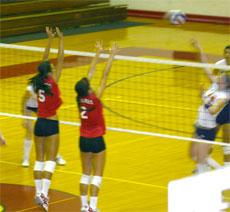 Jaimee Humphrey and Rachel Cox work at blocking during the BC tournament on Sept. 1.