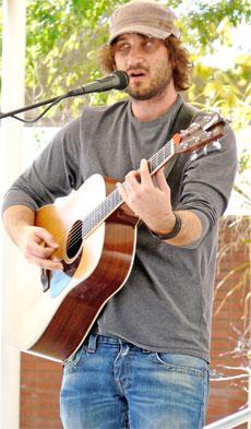 Mike Vitalli plays in the Free Speech Area on March 10 during Spring Fling.