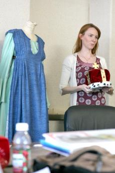 Costume designer Kat Brinkley demonstrates costumes for the BC play Ondine during a presentation on Feb. 27.