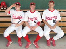 From left to right: Brandon Boren, Casey Brown and Jeff Burleson sit in the dugout following a 5-3 victory over Citrus.