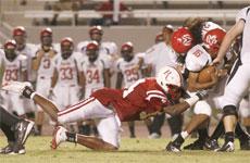 BC sophmore, Quin Woods, helps sack the Fresno City College quarterback during the Sept. 6 game.
