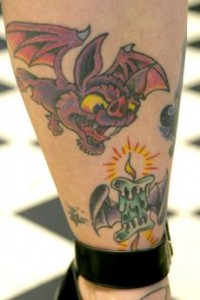 Sarratts tattoo of a bat.