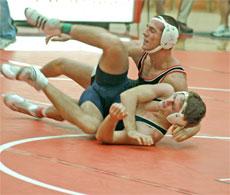 BC wrestler Mike Cavanaugh, who went 4-0 in the Western State Conference tournament, competes against a member of West Hills College.