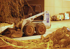A tractor at the Chiller construction site sits next to the library Nov. 17.