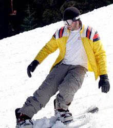 Online editor Andrew Ansolabehere in a snowboarding challenge at the Alta Sierra ski resort, Feb. 27. He competed in various aspects of the sport including board control and distance before a fall.
