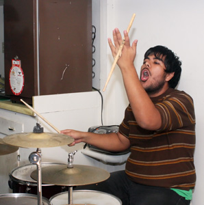 Vanity Avenue drummer  and BC student Chris Borbon plays during a jam session on Nov. 23. Vanity Avenue will be playing their next show on New Years Eve at Fishlips Bar and Grill.