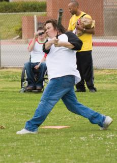 Student Goverment Association Senator Shawn Newsom takes a swing for the Bakersfield College SGA in a softball game against faculty March 25. The faculty won the game 13-3.