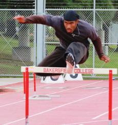 Bakersfield College track athlete Matthew Jones warms up at BC on April 30. He placed fifth in the 110-meter hurdles the following day at the Western State Conference Finals.