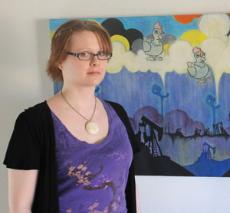 Bakersfield artist Jen Raven poses with her painting What Dreams May Come. at her home Sept. 15.