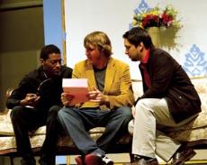 From left: Jotae Fraser, Justin Pool and Sean Hill rehearse a scene from the play A Flea in Her Ear on Feb. 25.