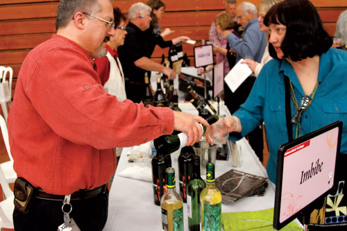 Attendees indulge in some divine wine