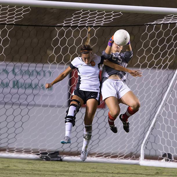 BC goalie Alondra Villa (25) fights for the possession of the ball while Venturas Melissa Aldrete (6) attempted to head the ball in. The Sept. 18 matchup ended in a 2-2 draw.