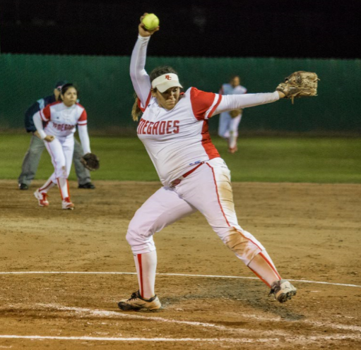 McKenna Valencia begins her windup during a match against Taft College.