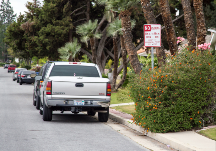 Cars sit west along Princeton Ave. where parking now requires a residential permit.