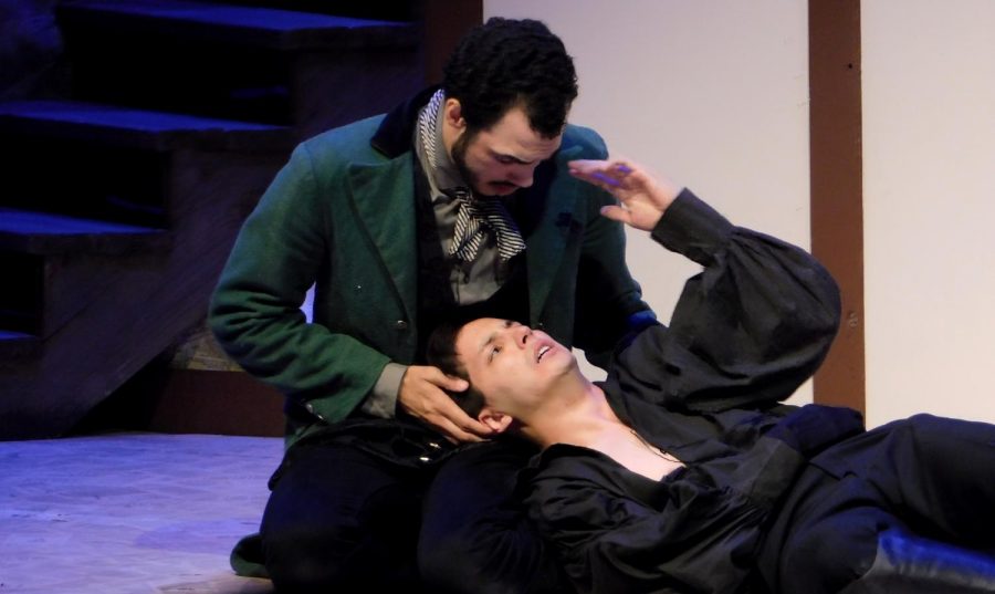 Horatio (Tevin Joslen) holds Hamlet’s (Ryan Lee) head.