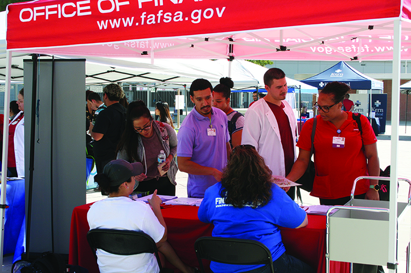 Bakersfield College radiology students talk to financial aid reps at a Office of Financial
Aid booth on campus during the Health Connections Fair held on Oct. 5.