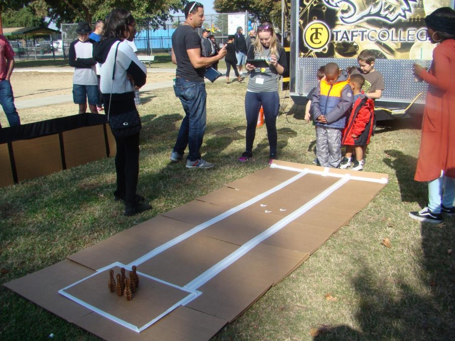 Taft College offering children attending the event to play a bowling game.