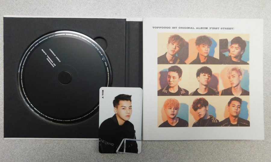 The physical copy of Topp Doggs first original album First Street comes with the CD, a photo album, and a collectors card. I got former Topp Dogg member A-Tom.