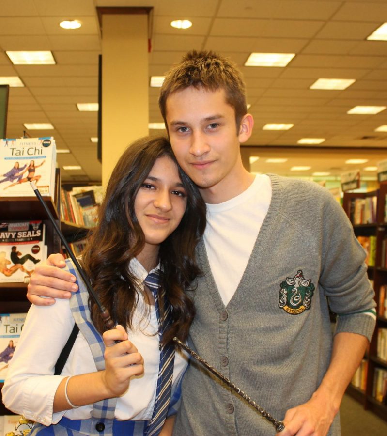 Mayra Lopez and Neil Zuazo attend a Harry Potter celebration dressed as book characters.