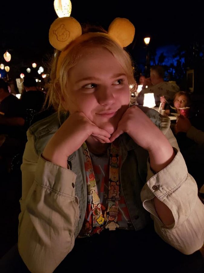 Miranda Defoor smiles in the Blue Bayou restaurant
