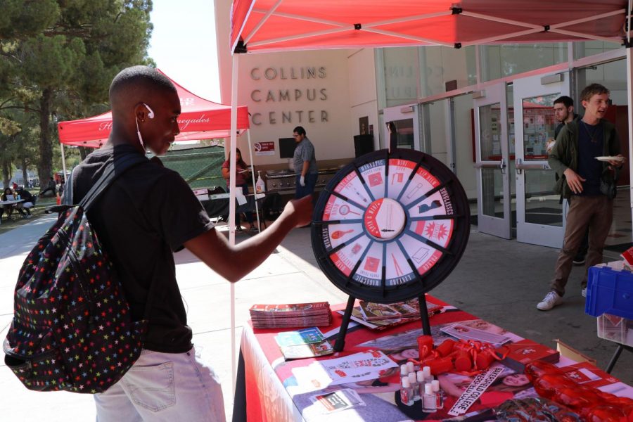 Daryl Maiden spins the wheel to get some free BC swag.