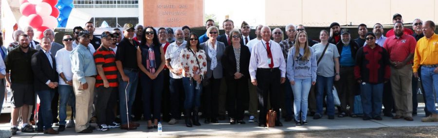 Veterans and officals attending the the groundbreaking ceremony for the new Vernon Valenzuela Veteran’s Center at Bakersfield 
College pose before having their photo taken via drone.
