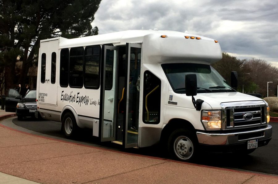 The Renegade Express shuttle waits for riders outside the administration building.