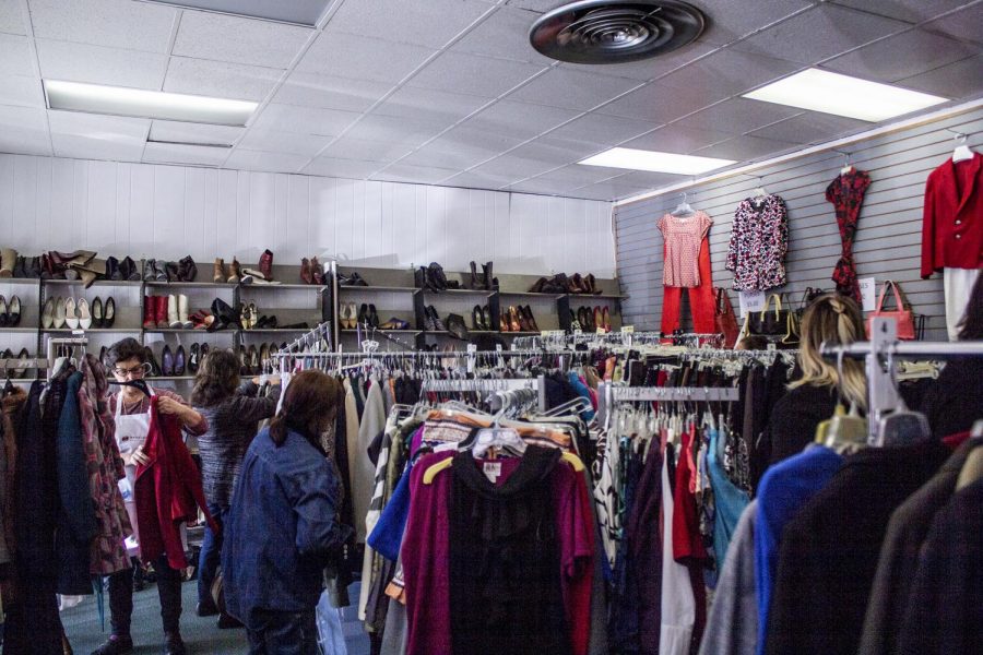 Women browse the shop for sales and bargains during Dress for Success’s clearance sale on Feb. 6.