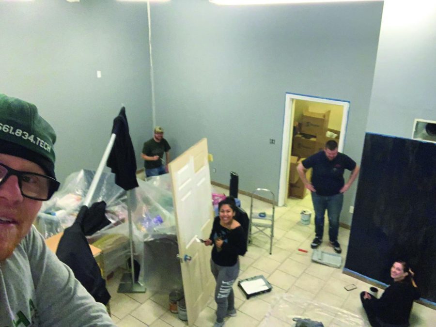 Group members (left to right) John Heath, Timothy Gobler, Mia Cifuentes, Ian Sharples, and Sarah LeVan work on a nursery