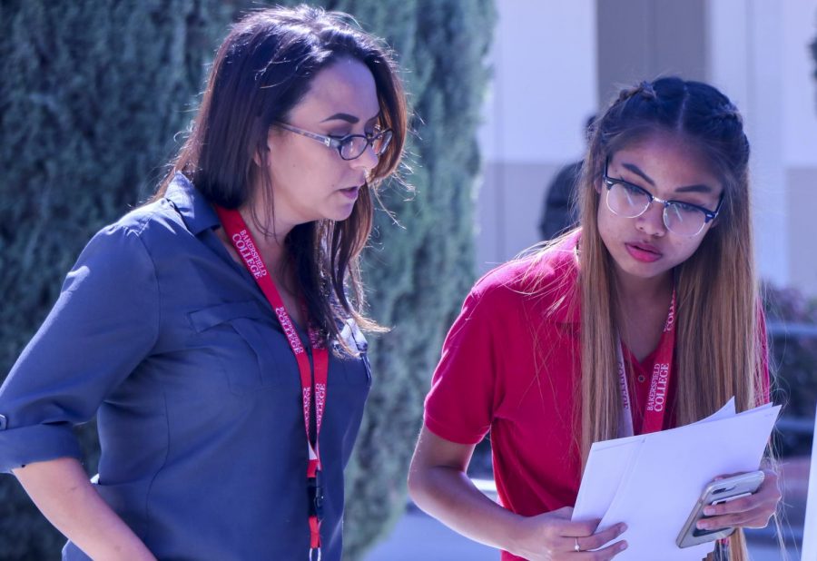 Bakersfield College student Mya Thanda attends the Business Pathway Career Expo on April 24. (Far left) Nikki Castruita, the department assistant for outreach at BC. 