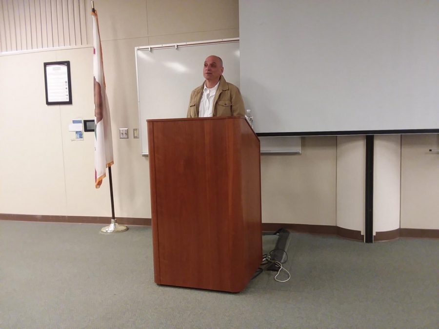 Eric Schlosser informs the audience on the huge issues of fast food and nuclear weapons in the Levan Center on April 4.  