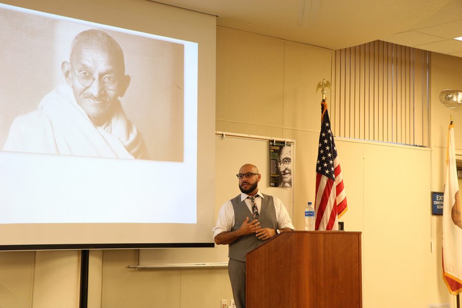 Jeff Newby speaking about Gandhi’s life and upbringing in the Levan Center, Sept. 23.  