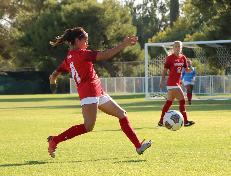 The Renegade’s Alondra Tornero (11) about to passes the ball to teammate Nikolle Prather (12) during the first half of the Women’s Soccer game against the Citrus College Owls at BC Soccer Field, on Oct. 8. 