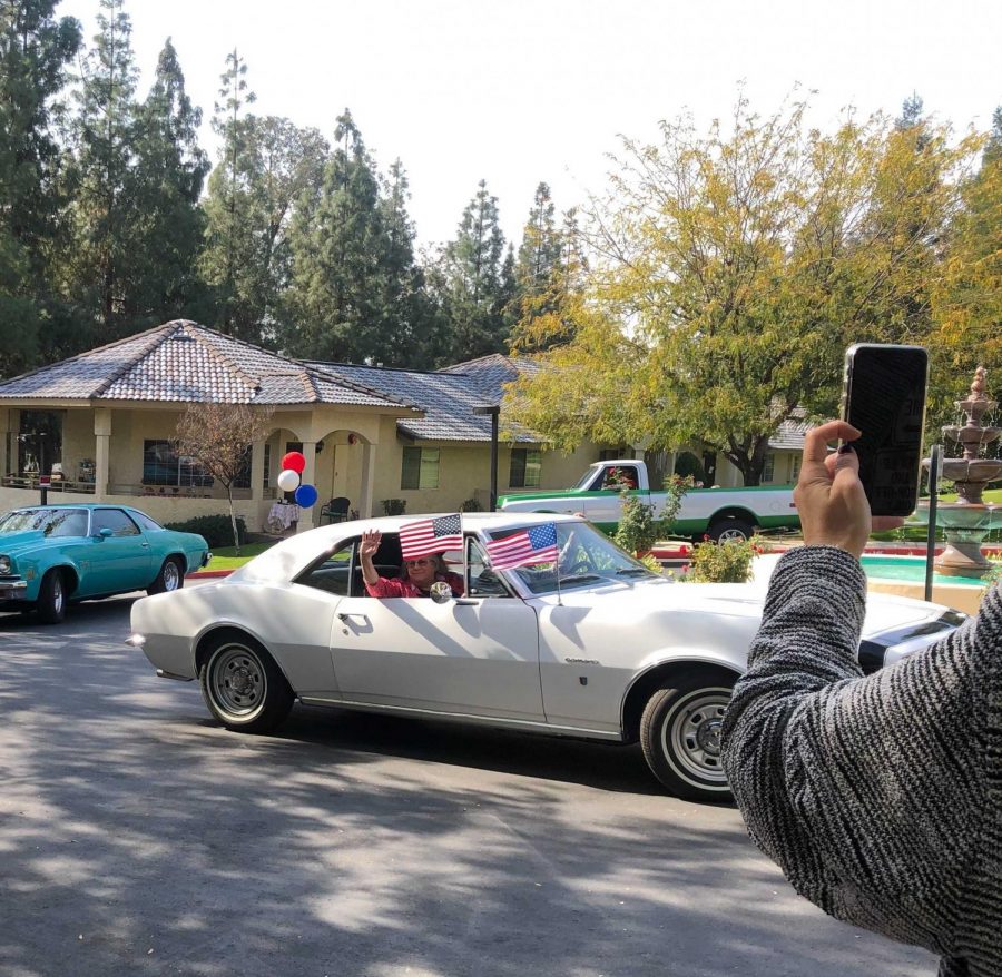 One of the cars that drove by on Columbus Estates at the Veterans Day Drive on
Nov. 11.