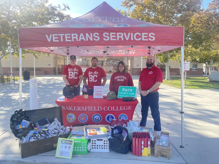 BC VRC Manager Jenny Frank, Veteran Educational Advisor Eric Hansen, veterans and student employees Aaron Fennell and Nicholas Lane are photographed as they wait for more “Stock the Locker” donations outside the Outdoor Theatre. 