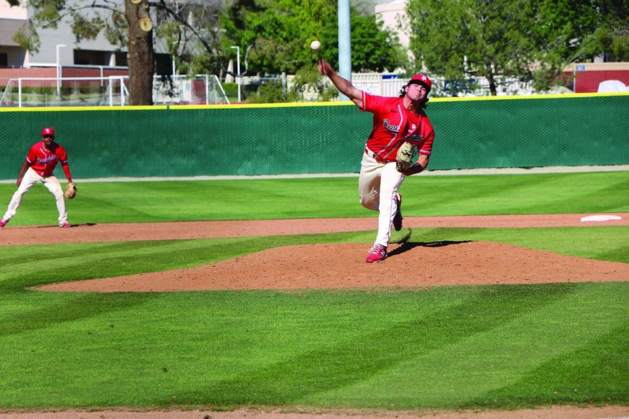 Pitcher Tim Ruiz pitches during March 12 game