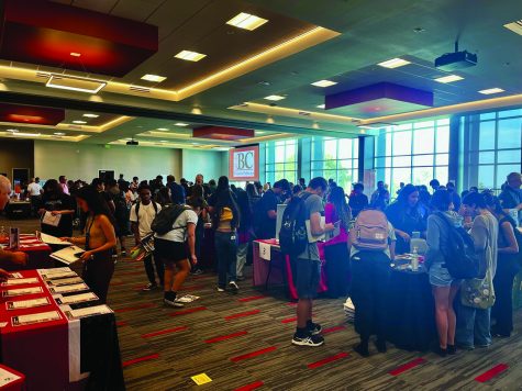 Lots of students and college representatives walking around ballroom on Bakersfield College campus on Sept. 12 for transfer day