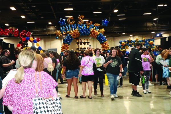 Students and parents enter the main floor of the 24th annual College Night at the Mechanics Bank Convention Center.