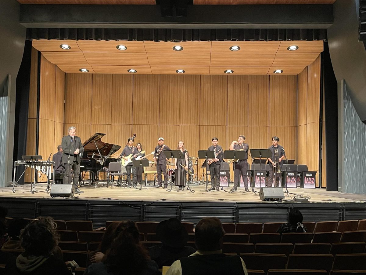 The Jazz Band students prepare for their first performance of the night as the seats in the audience fill up.