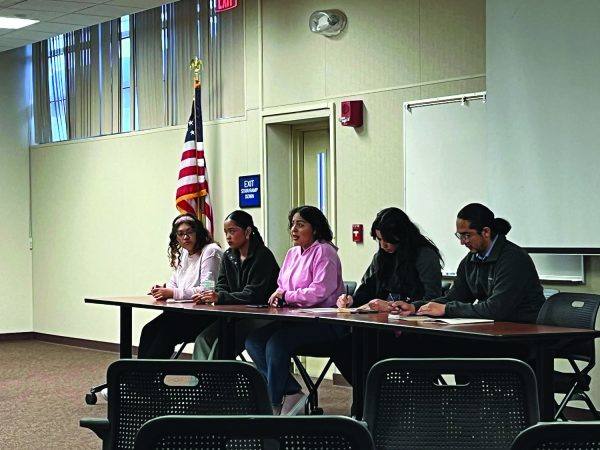 From left: Cindy Ceja Miranda, Raya Arafah, Abigail Tamayo, Johana Solis and Randy Arevalo participating in the debate.