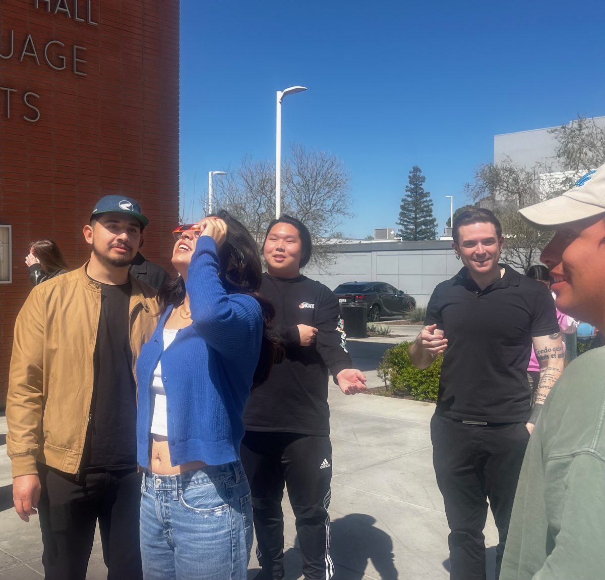 Japanese one students watching the 2024 solar eclipse on April 8. in front of the language arts building on Bakersfield College campus