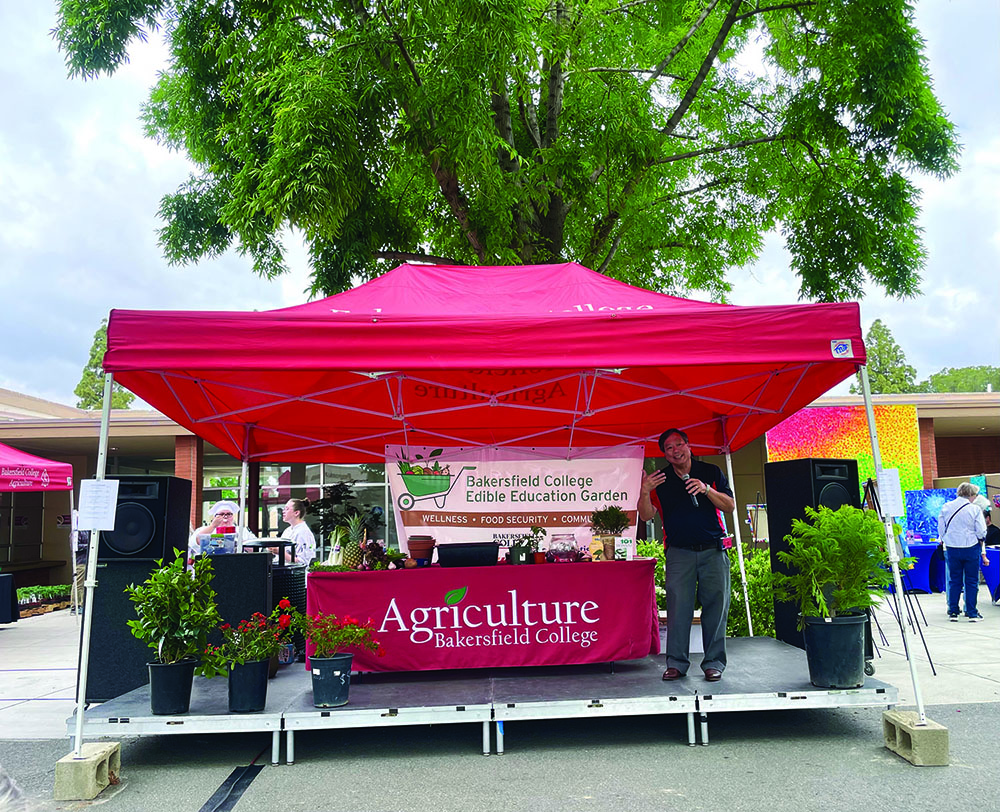 Bakersfield College Agriculture Professor Lindsay Ono speaks to the crowd regarding fruit and plant care tips.